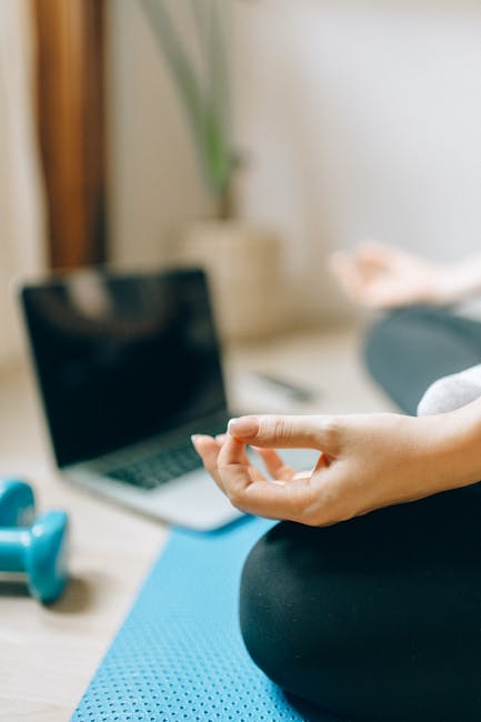 Person starting their yoga journey on a mat at home
